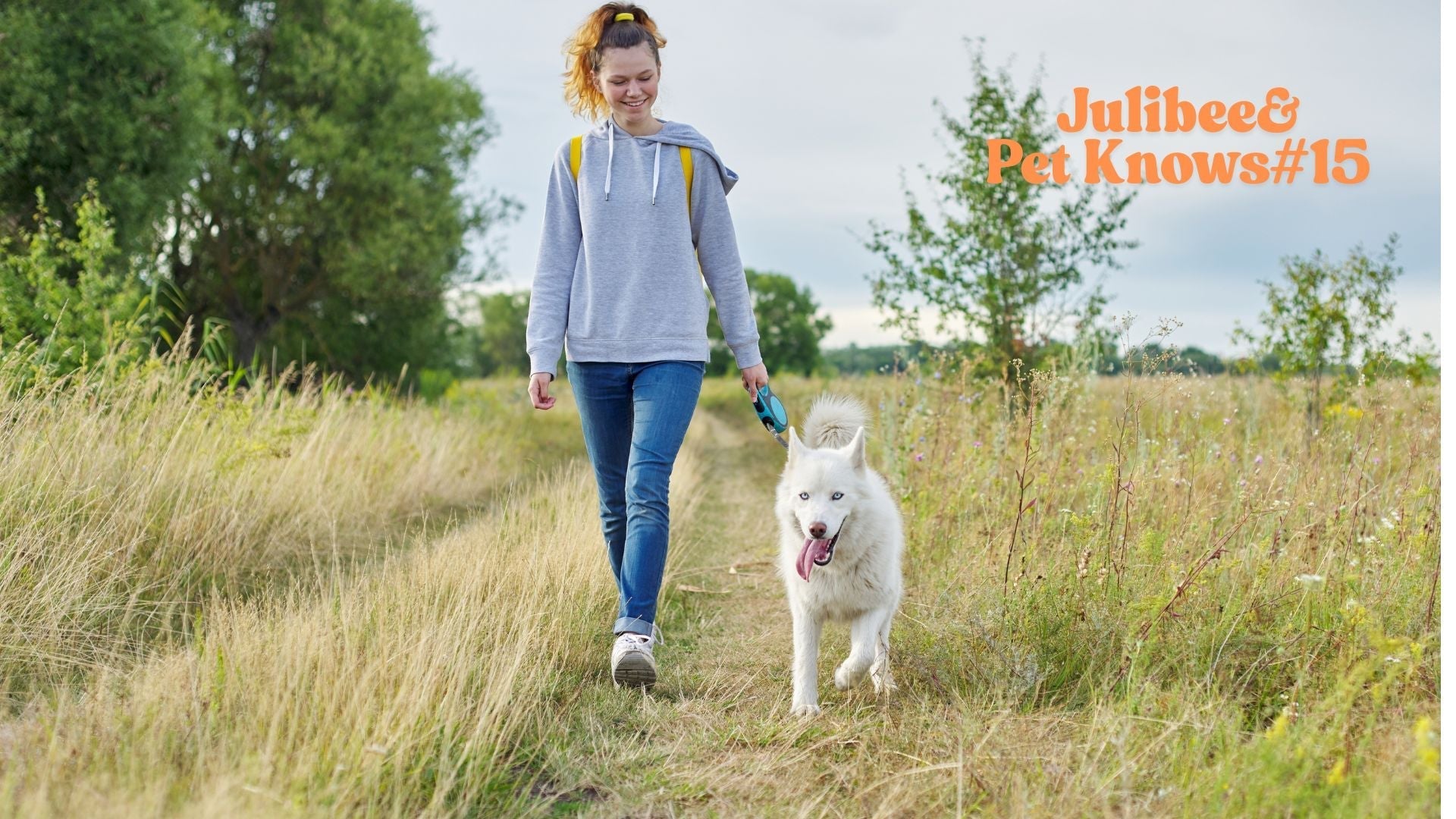Woman walking dog on trail with leash - dog hiking etiquette & walking set tips from Julibee's
