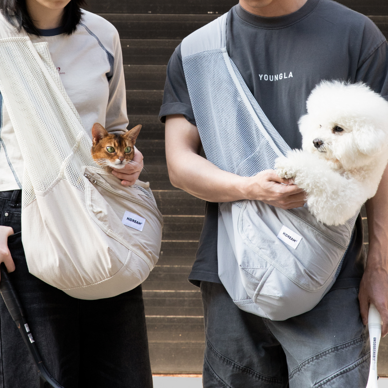 urbanTrail Breathable Pet Sling Bag - Breathable mesh carrier for cats and dogs, ideal for travel and daily walks.