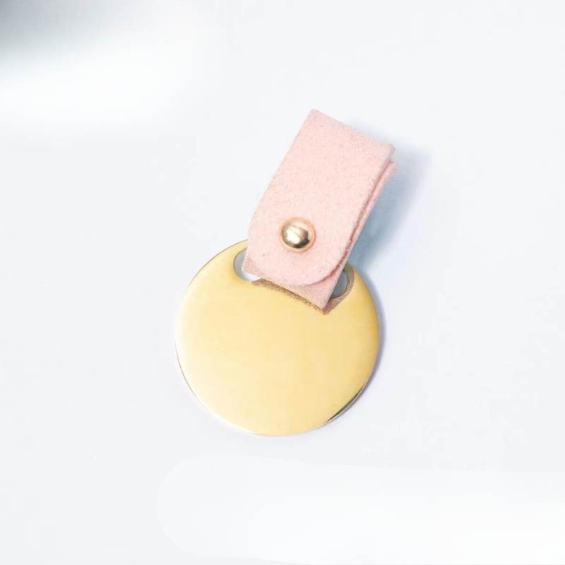 Custom pink suede pet ID tag with gold disc, stylish pet identification accessory