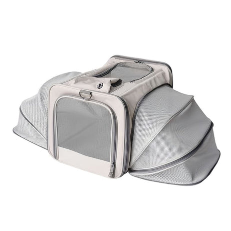 Traveler Expandable Pet Carrier Bag - Air Approved, light gray expandable design with mesh panels for pet travel.