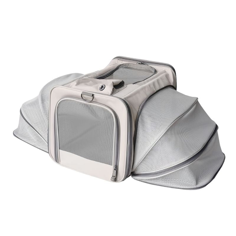 Traveler Expandable Pet Carrier Bag - Air Approved, light gray expandable design with mesh panels for pet travel.