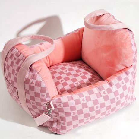 Pink tartan pet car seat with soft padding and carrying handles for dog travel safety